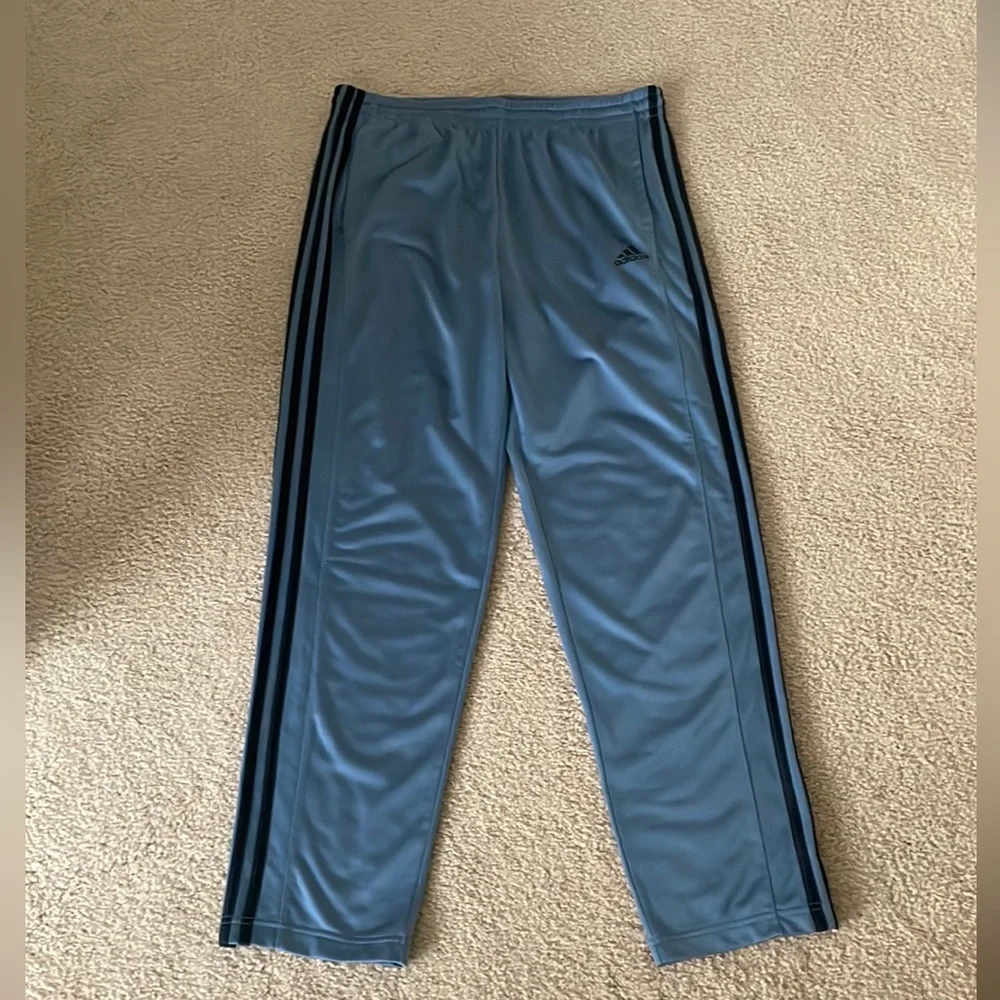 Adidas Men’s Joggers. Blue/grey color with black stripes.